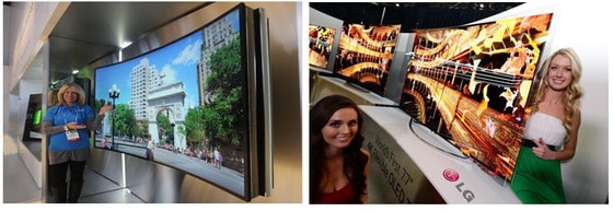 지난 7일(현지시간) 미국 라스베이거스에서 열렸던 'CES 2014' 국제가전제품박람회에서 삼성전자(왼쪽)와 LG전자 도우미들이 가변형 TV에 대해 소개하고 있다.(사진제공=삼성전자, LG전자) © News1  