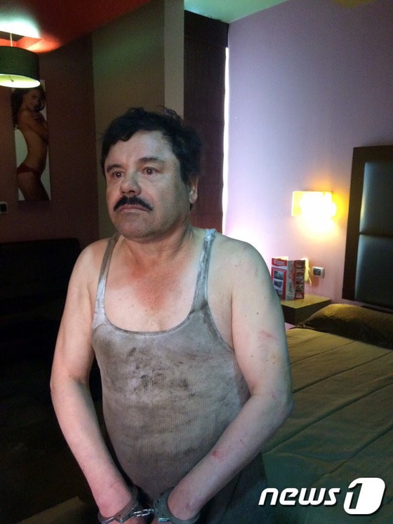 멕시코 마약왕 호아킨 '엘 차포' 구스만이 8일(현지시간) 6개월간의 도주 끝에 붙잡혔다. ⓒ AFP=뉴스1