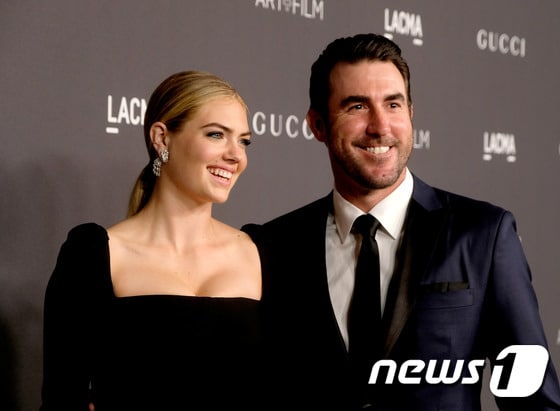 저스틴 벌렌더(오른쪽)와 그의 약혼녀 케이트 업튼. ⓒ AFP=News1