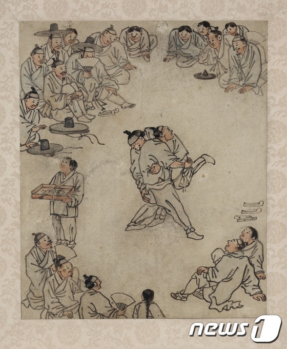김홍도의 '씨름도' 26.9x22.2cm (국립중앙박물관 제공) ⓒ News1