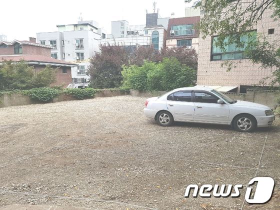빈집을 철가하고 조성한 주차장.(용인시 제공)ⓒ News1