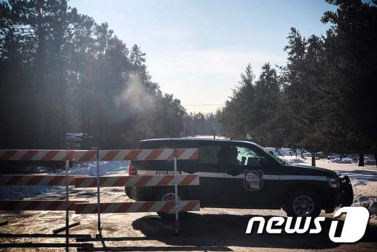 제이미 클로스가 발견된 장소에 서 있는 경찰차. ⓒ AFP=뉴스1