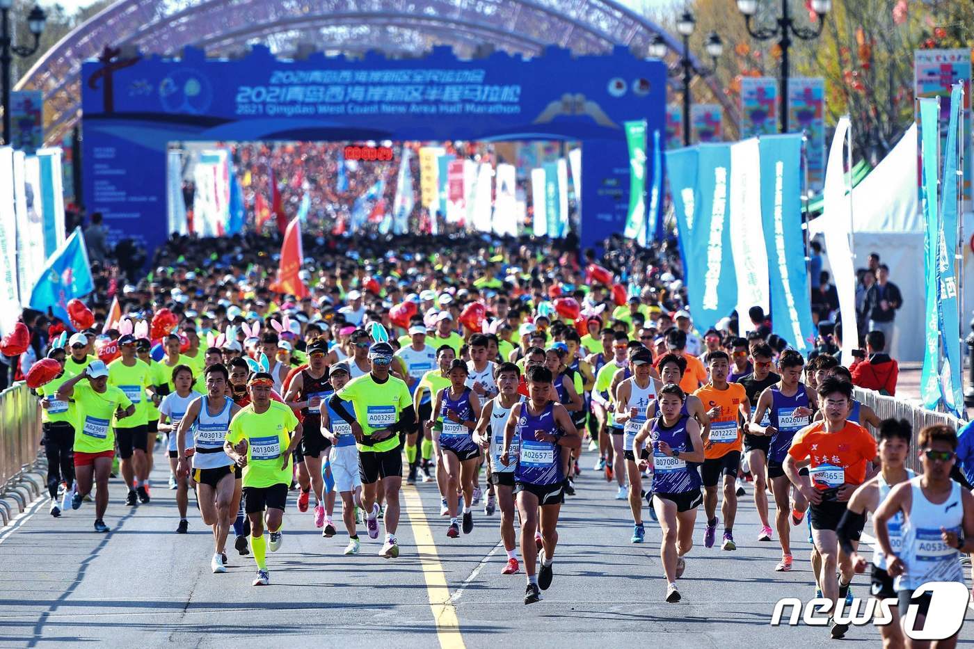 2021년 4월18일(현지시간) 중국 동부 산둥성 칭다오에서 열린 해안 하프 마라톤에서 참가자들이 뛰고 있다. ⓒ AFP=뉴스1 ⓒ News1 조소영 기자 (사진은 기사 내용과 무관함)