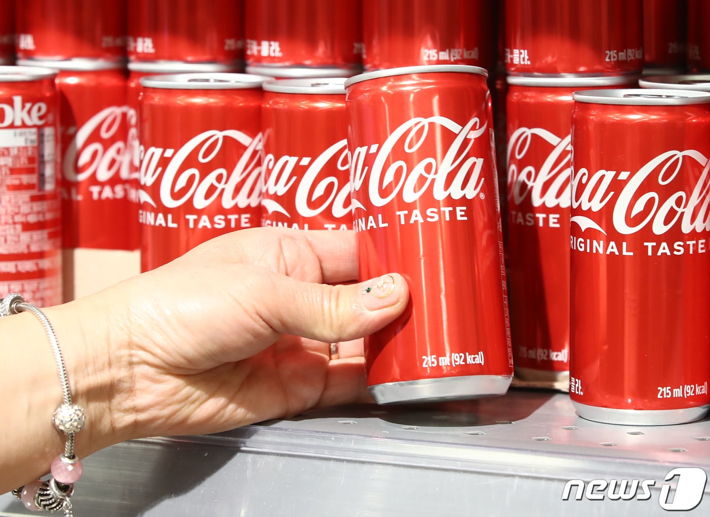 버핏 34년간 보유해 수익률 1000만%인 주식은? - 뉴스1