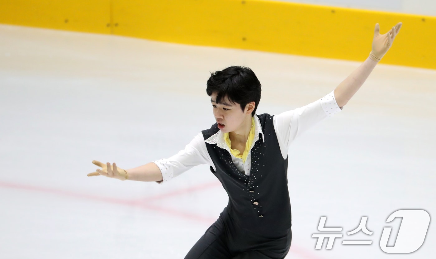 피겨 서민규, 한국 남자 최초 금메달