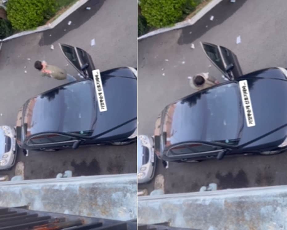 음주 사실을 신고받고 고객의 차량을 부수고 있는 대리기사. 온라인 커뮤니티 갈무리.