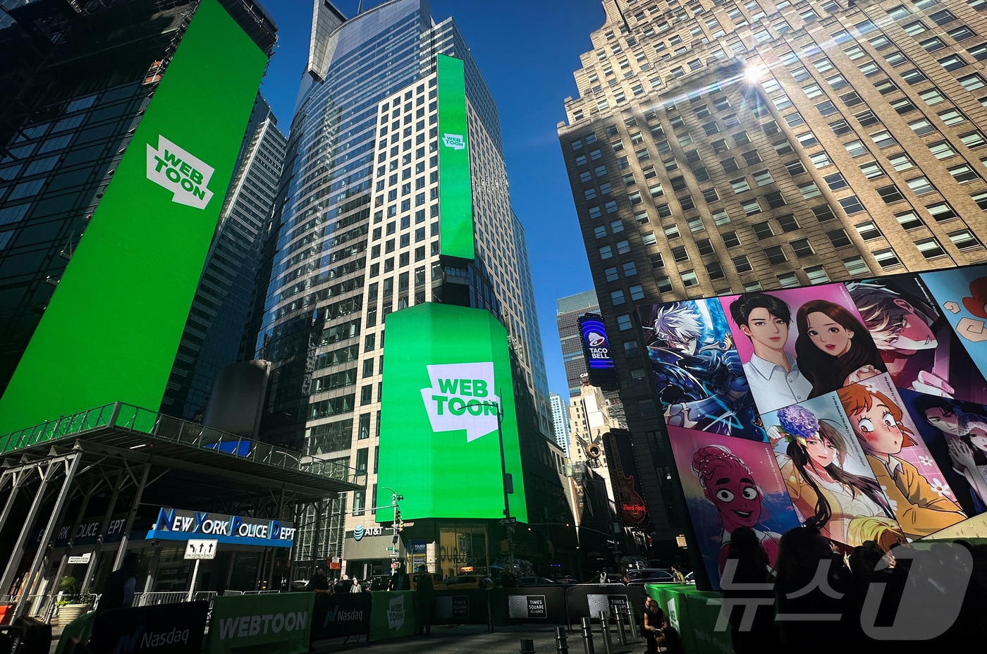 27일(현지시간) 뉴욕증시 상장에 성공한 네이버 웹툰 시각물이 뉴욕 타임스 광장을 수놓고 있다. 2024.06.27 ⓒ 로이터=뉴스1