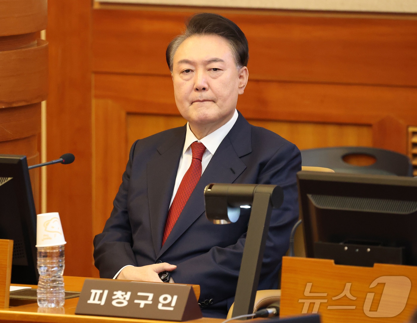 윤석열 대통령이 4일 헌법재판소가 대통령 탄핵을 만장일치로 인용하면서 파면됐다. 사진은 윤석열 대통령이 지난 2월 13일 헌법재판소 변론기일에 자리한 모습. (뉴스1 DB) 2025.4.4/뉴스1