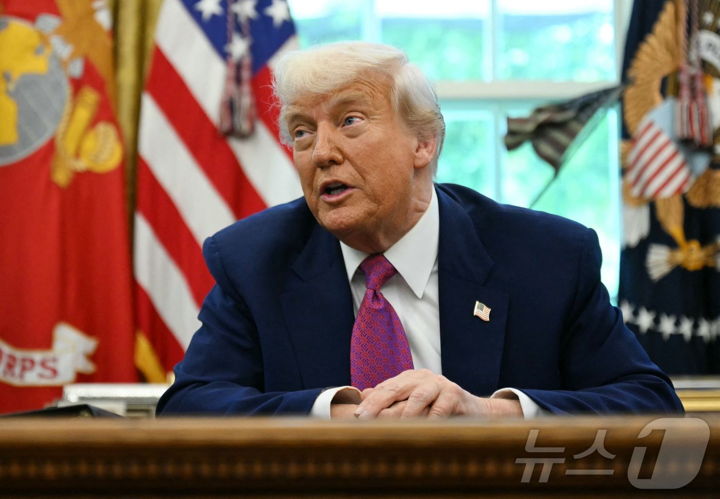 도널드 트럼프 미국 대통령이 20일(현지시간) 워싱턴 백악관에서 열린 '골든돔' 추진 계획 발표 행사서 "244조원 투입해 지상·해상·우주배치 미사일로 적 미사일·드론 요격하겠다”고 밝히고 있다. 2025.05.21 ⓒ AFP=뉴스1 ⓒ News1 우동명 기자