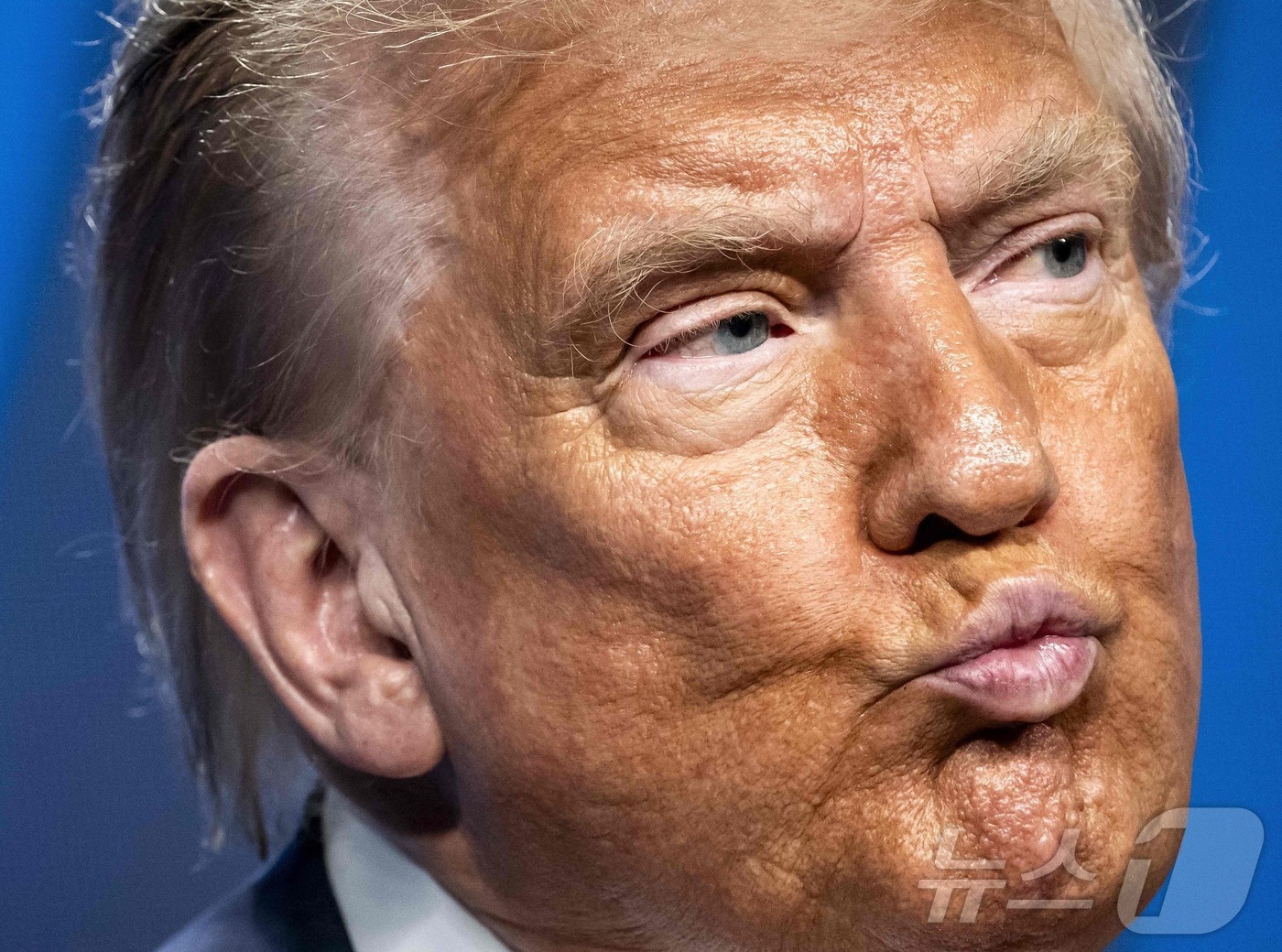 도널드 트럼프 미국 대통령이 25일(현지시간) 헤이그에서 열린 북대서양조약기구(NATO) 정상 회담에서 기자회견 중 불만스러운 표정을 짓고 있다. 2025.06.25 ⓒ AFP=뉴스1 ⓒ News1 류정민 특파원