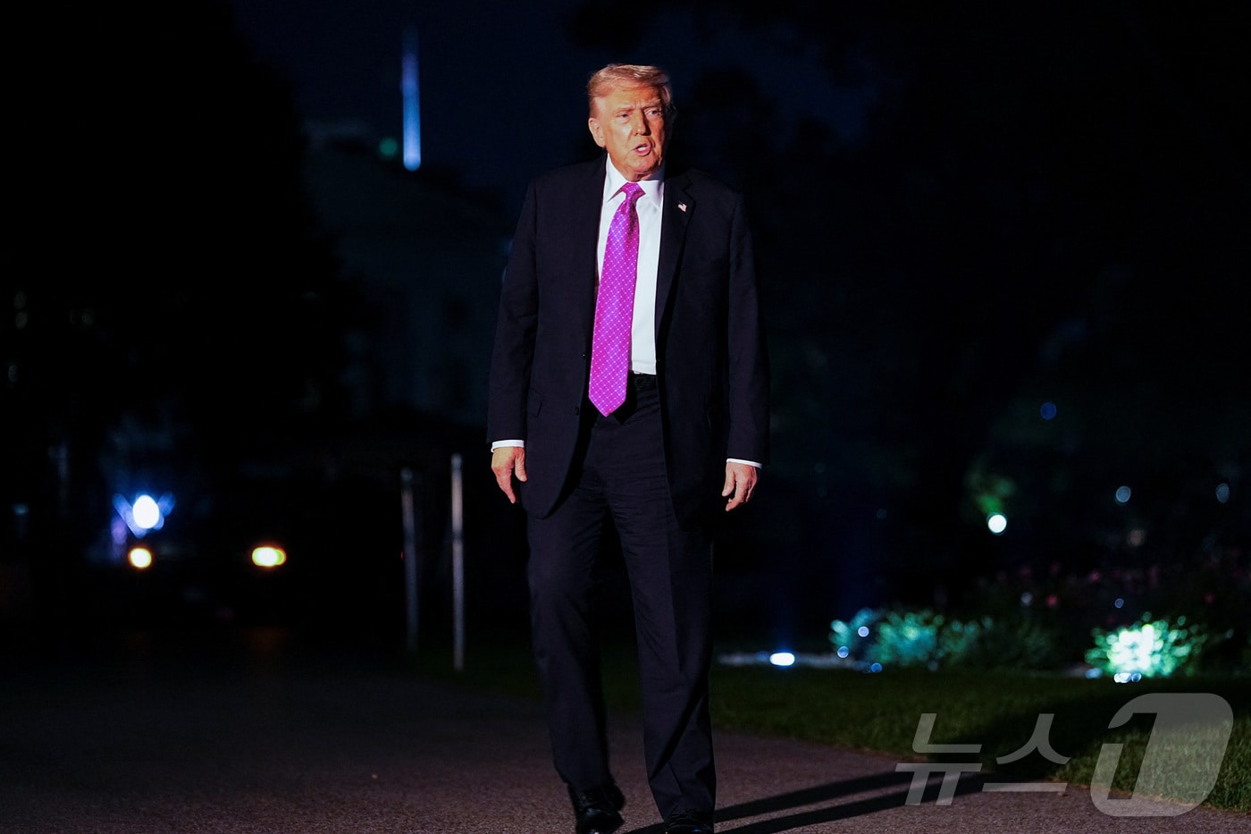 14일(현지시간) 뉴저지에서 주말을 보낸 도널드 트럼프 미국 대통령이 백악관에 돌아오면서 취재진의 질문에 답하고 있다. 2025.09.14 ⓒ 로이터=뉴스1 ⓒ News1 김지완 기자