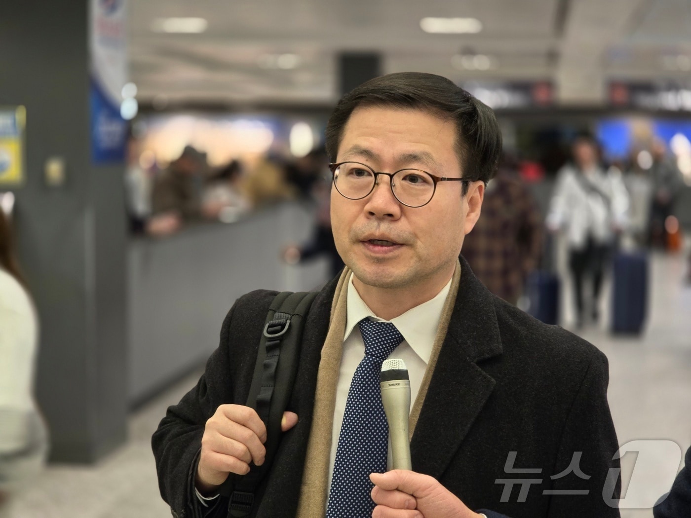 여한구 산업통상자원부 통상교섭본부장이 11일(현지시간) 미국 워싱턴DC 덜레스국제공항을 통해 입국하면서 기자들의 질문에 답하고 있다. 2026.01.11. ⓒ News1 류정민 특파원
