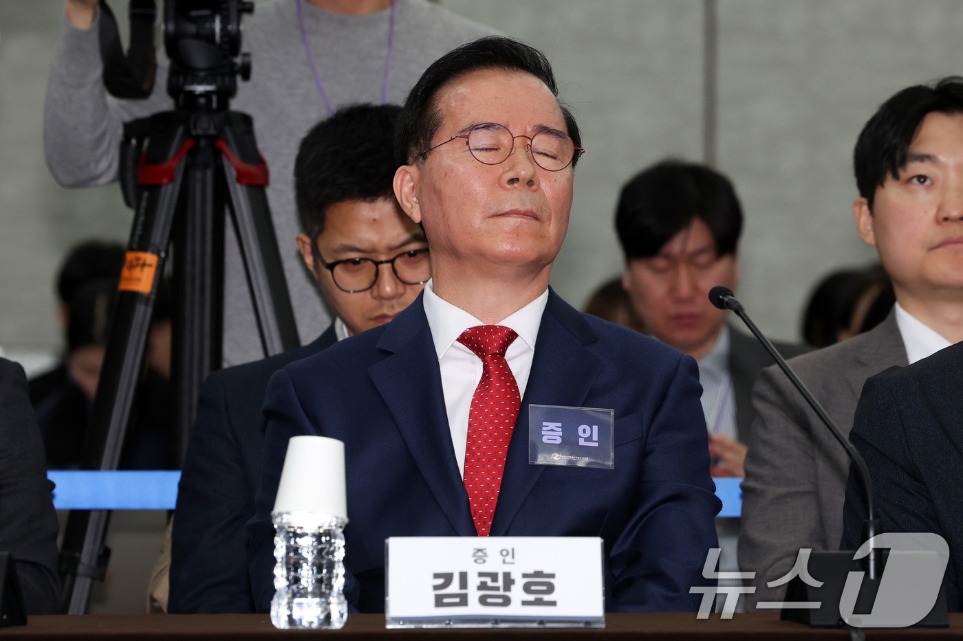 김광호 전 서울경찰청장이 12일 서울 중구 은행회관에서 열린 10·29 이태원참사 진상규명 청문회에서 조사관 질문에 답변을 거부하고 있다. (공동취재) 2026.3.12 ⓒ 뉴스1 최지환 기자