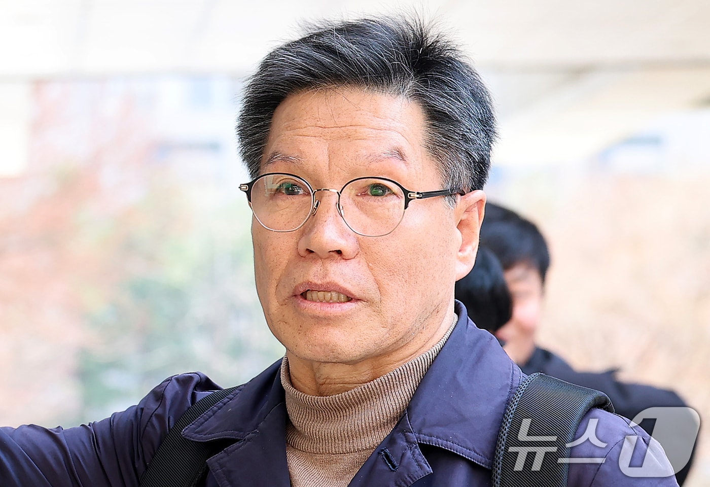 일본군 위안부 피해자 모욕 및 허위 사실을 유포한 혐의를 받는 김병헌 위안부법폐지국민행동 대표가 20일 오후 서울 서초구 서울중앙지법에서 영장실질심사를 받기 위해 출석하고 있다. (공동취재) 2026.3.20 ⓒ 뉴스1 김명섭 기자