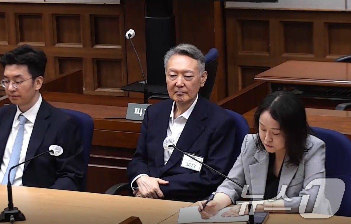 27일 서울 서초구 서울중앙지방법원에서 윤석열 전 대통령의 공직선거법 위반 혐의 1심 선고가 진행되고 있다. 이날 법원은 윤석열에게 징역 1년 6개월에 집행유예 3년을 선고했다. (서울중앙지방법원 제공. 재판매 및 DB금지) 2026.7.27 ⓒ 뉴스1